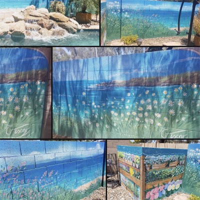 Scenic wall mural blending backyard flowers with a panoramic ocean horizon.