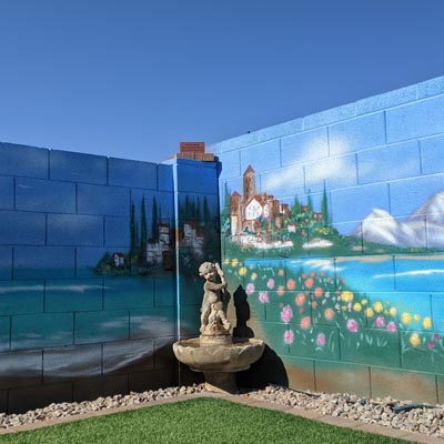 Special commemorative sunset mural painted as a tribute in a private backyard.